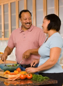 African American couple preparing healthy meal